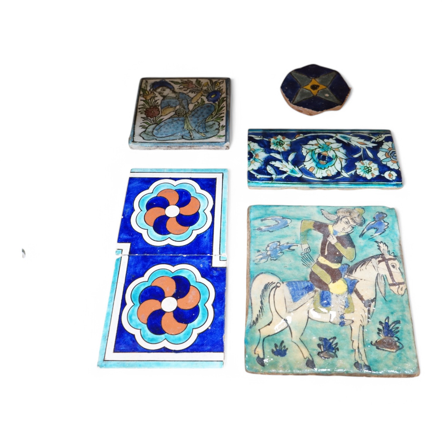 Six various Iznik and Islamic tiles, largest 25 x 22cm. Condition - fair